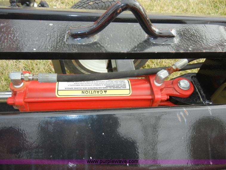 image for item A6689 KM Rake Caddy 8 wheel rake