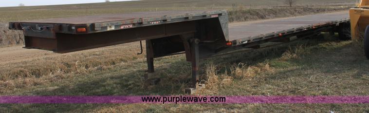 image for item B8899 1994 shop built tandem axle drop deck trailer