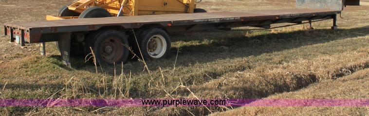 image for item B8899 1994 shop built tandem axle drop deck trailer