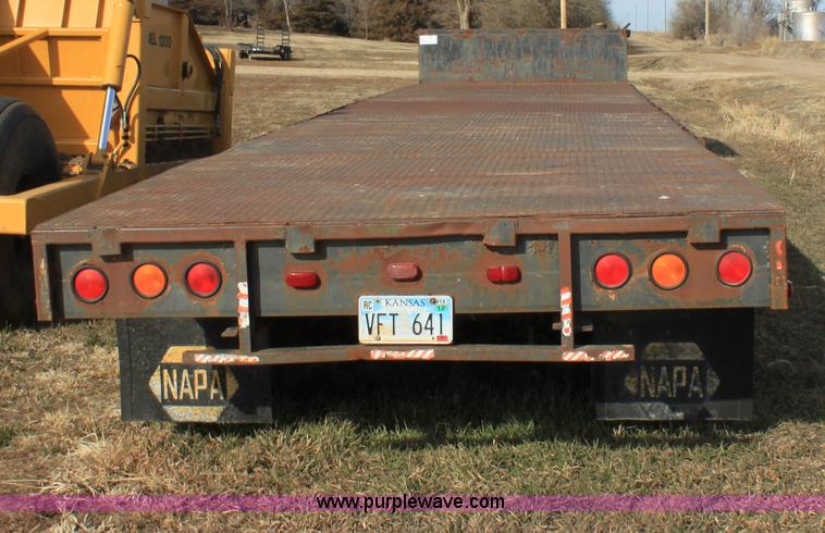 image for item B8899 1994 shop built tandem axle drop deck trailer