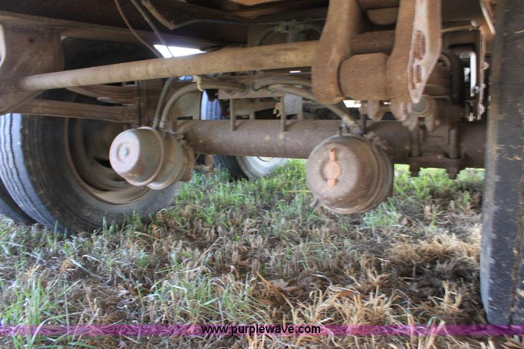 image for item B8899 1994 shop built tandem axle drop deck trailer