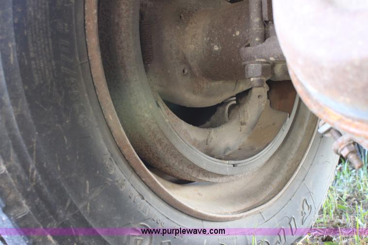 image for item B8899 1994 shop built tandem axle drop deck trailer