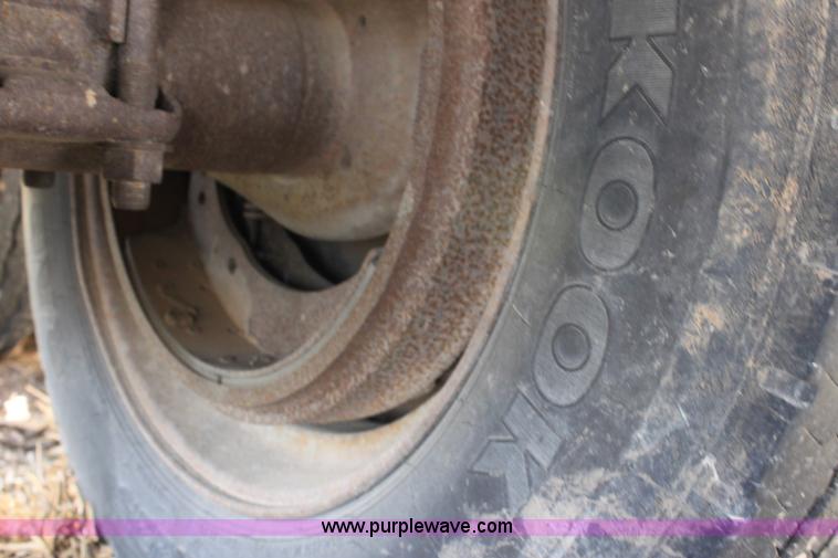 image for item B8899 1994 shop built tandem axle drop deck trailer