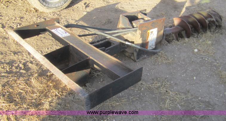 image for item B5623 Lowe 1200 post hole digger