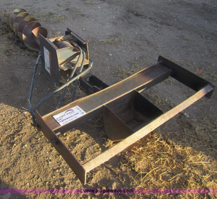 image for item B5623 Lowe 1200 post hole digger
