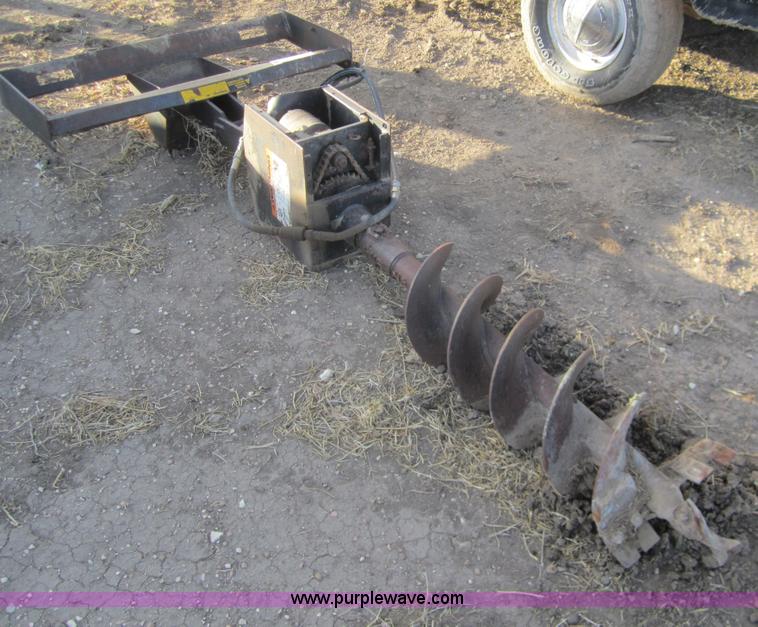 image for item B5623 Lowe 1200 post hole digger