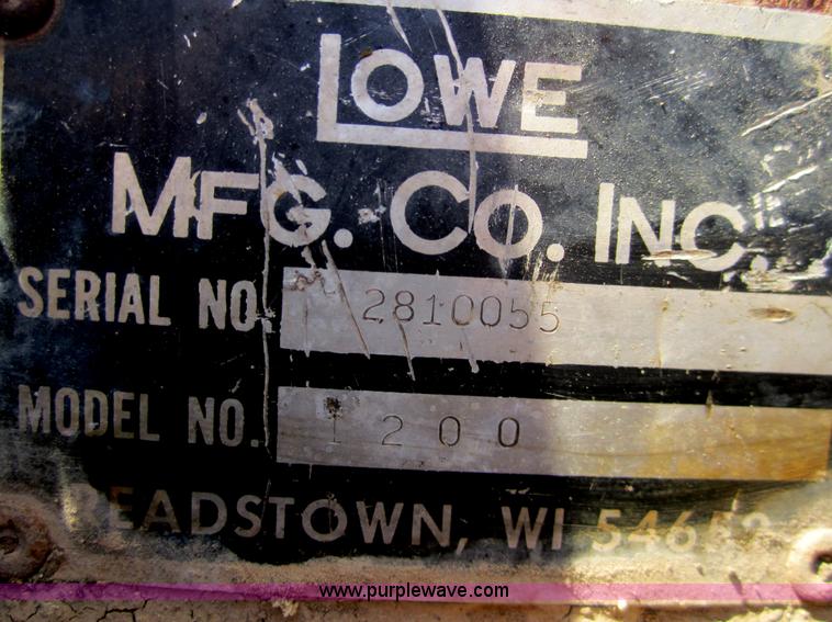 image for item B5623 Lowe 1200 post hole digger