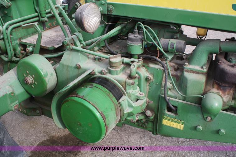 image for item A6720 1957 John Deere 520 tractor