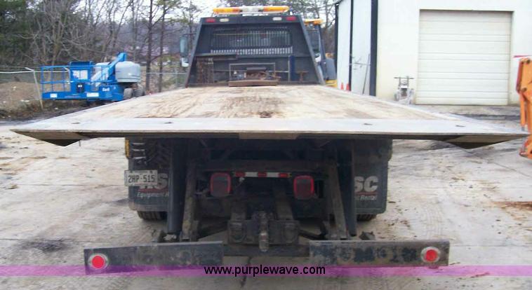 image for item A1873 2006 Freightliner M2 106 roll back truck