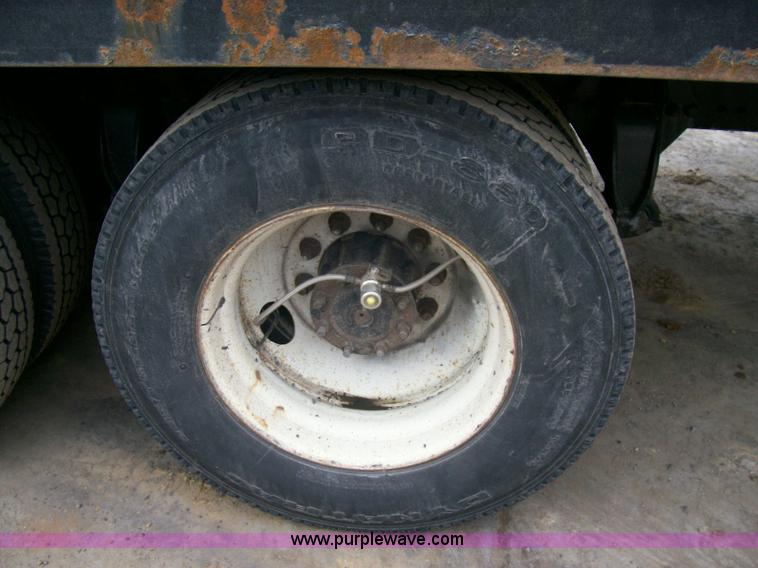 image for item A1873 2006 Freightliner M2 106 roll back truck