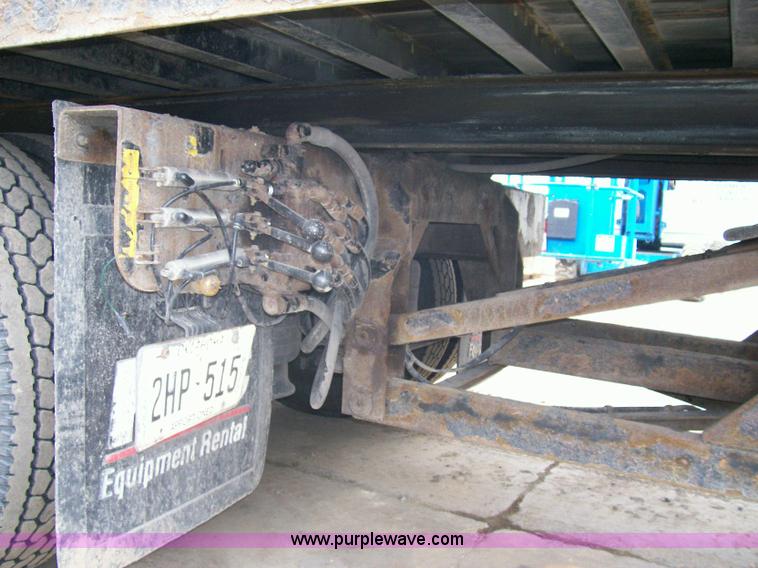 image for item A1873 2006 Freightliner M2 106 roll back truck