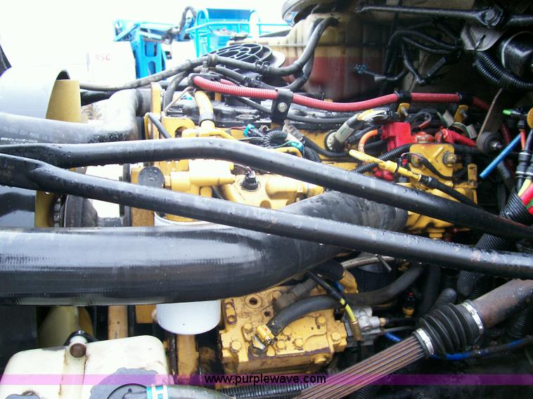 image for item A1873 2006 Freightliner M2 106 roll back truck