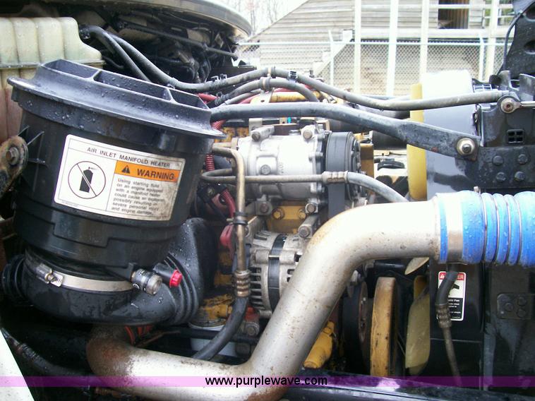 image for item A1873 2006 Freightliner M2 106 roll back truck