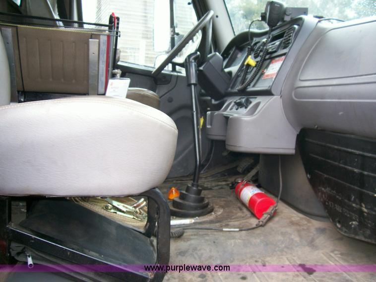 image for item A1873 2006 Freightliner M2 106 roll back truck