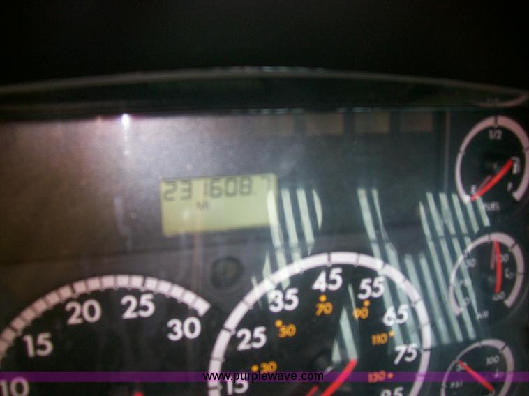 image for item A1873 2006 Freightliner M2 106 roll back truck