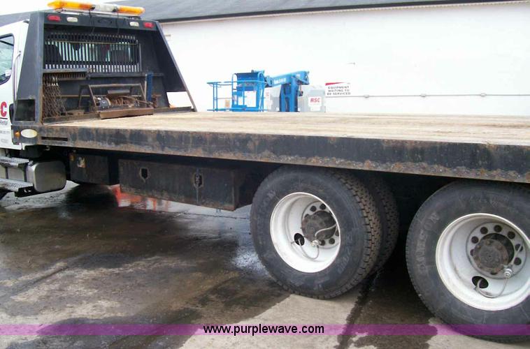 image for item A1873 2006 Freightliner M2 106 roll back truck