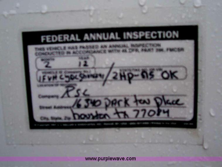 image for item A1873 2006 Freightliner M2 106 roll back truck