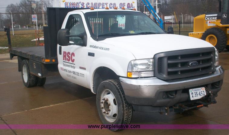 image for item A1876 2004 Ford F450 XLD flatbed truck