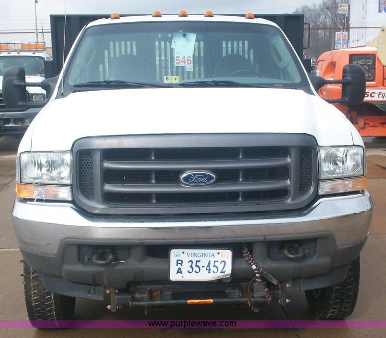 image for item A1876 2004 Ford F450 XLD flatbed truck
