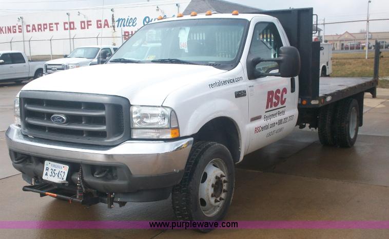 image for item A1876 2004 Ford F450 XLD flatbed truck