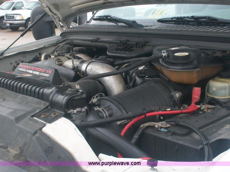 image for item A1876 2004 Ford F450 XLD flatbed truck