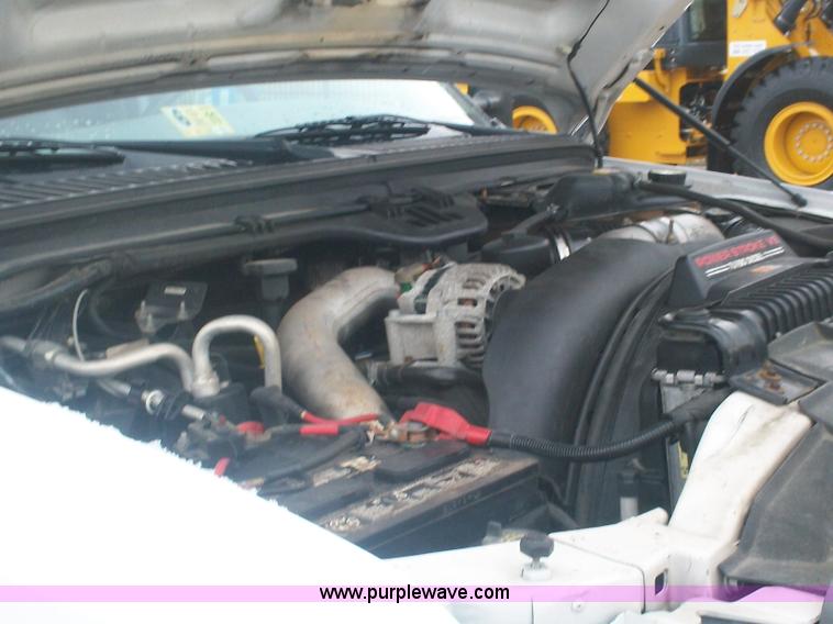 image for item A1876 2004 Ford F450 XLD flatbed truck