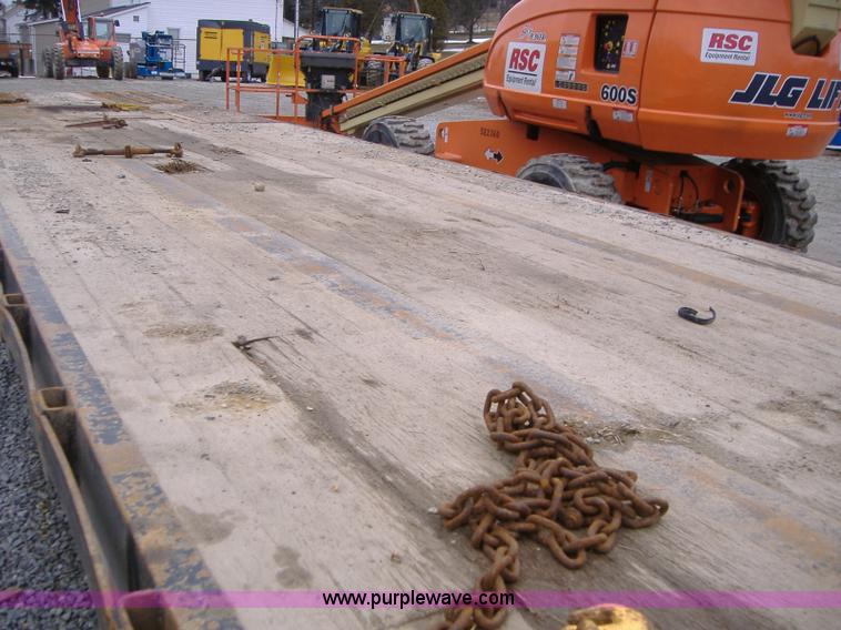 image for item A1879 2005 Ledwell 48' tandem axle hydratail tilt bed trailer