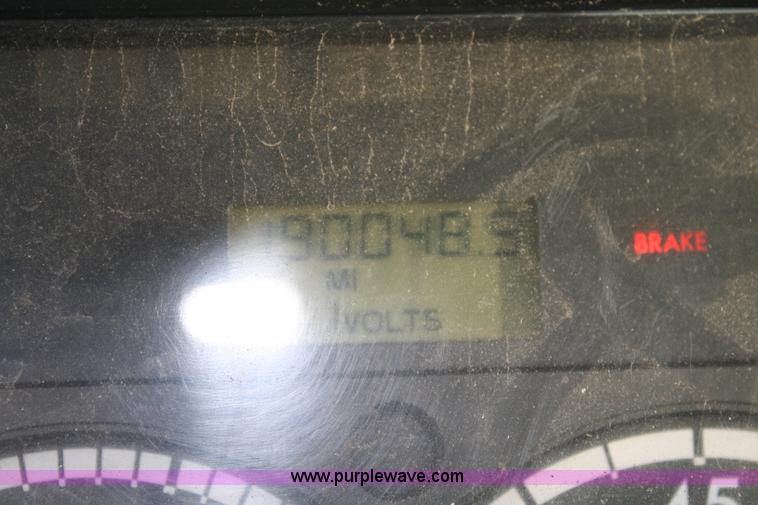 image for item A1882 2006 Freightliner M2 106 flat bed truck with hydraulic tail