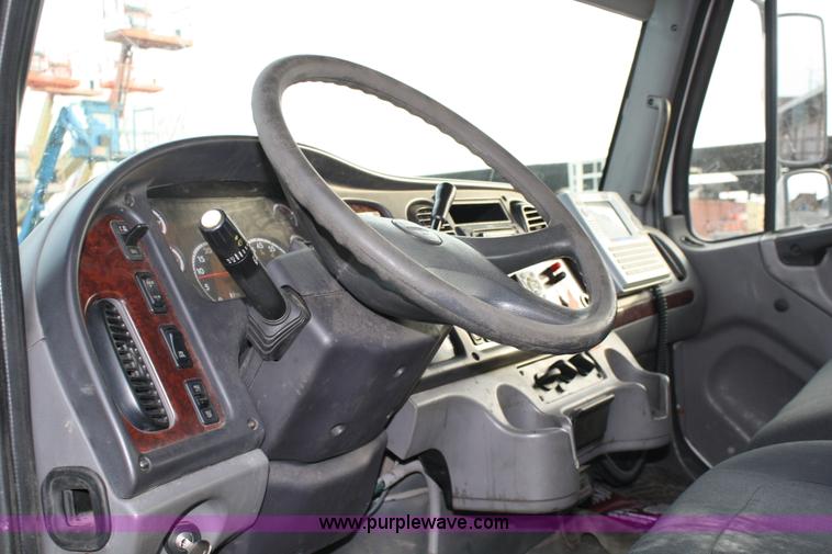 image for item A1882 2006 Freightliner M2 106 flat bed truck with hydraulic tail