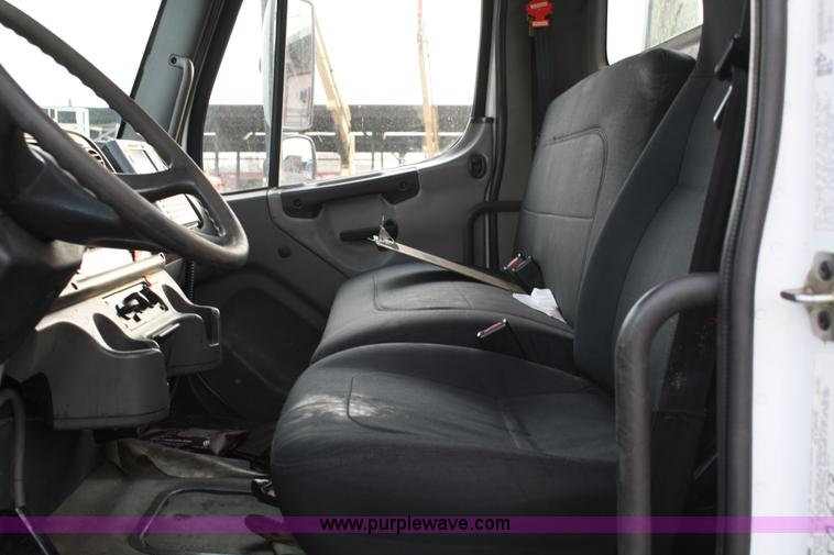 image for item A1882 2006 Freightliner M2 106 flat bed truck with hydraulic tail