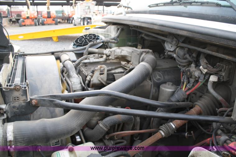 image for item A1882 2006 Freightliner M2 106 flat bed truck with hydraulic tail