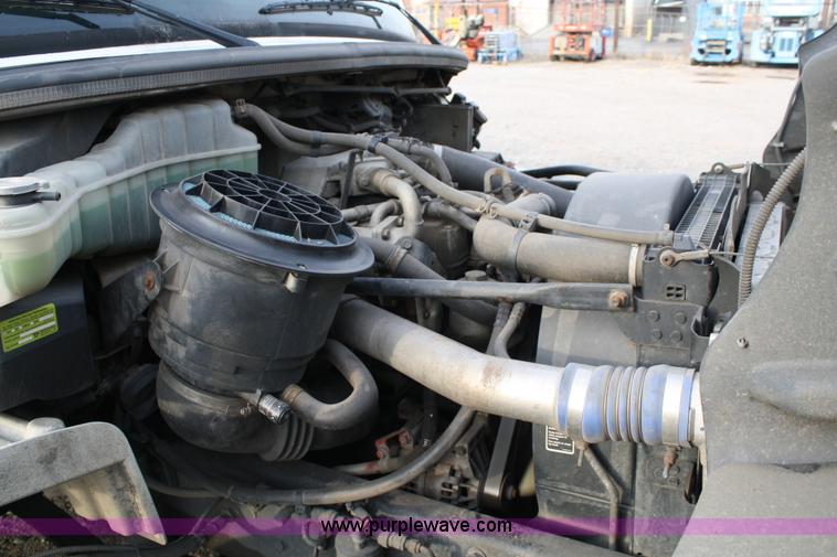 image for item A1882 2006 Freightliner M2 106 flat bed truck with hydraulic tail