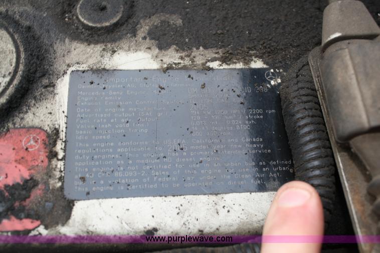 image for item A1882 2006 Freightliner M2 106 flat bed truck with hydraulic tail