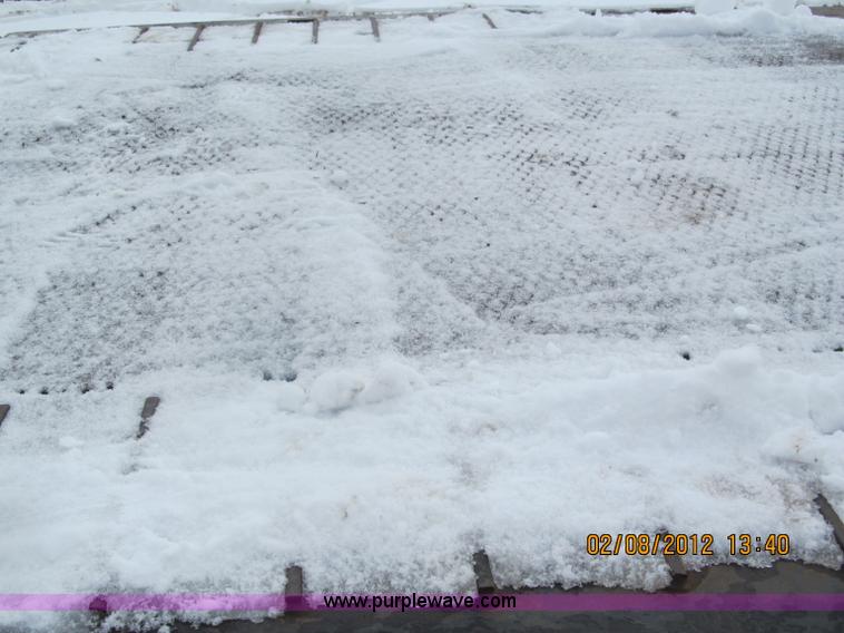 image for item B5100 2006 Ledwell 48' tandem axle hydratail tilt bed trailer