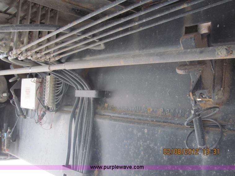 image for item B5100 2006 Ledwell 48' tandem axle hydratail tilt bed trailer