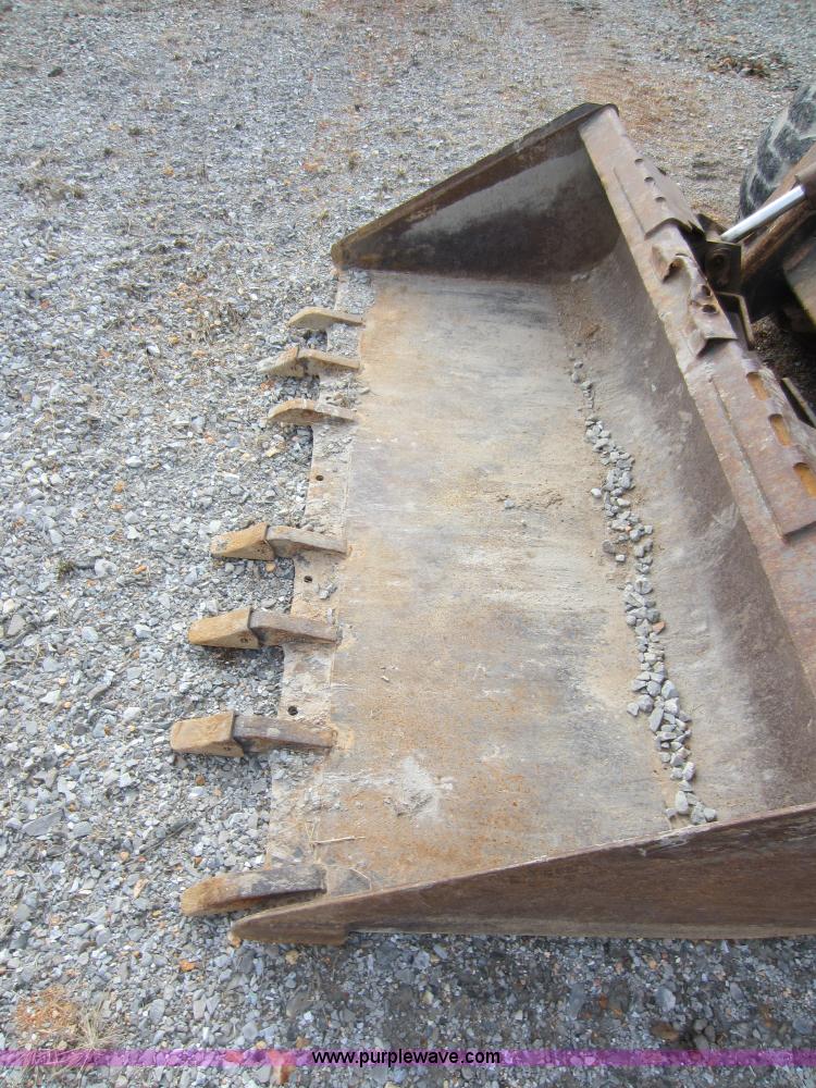 image for item A5627 2004 New Holland LS180 skid steer