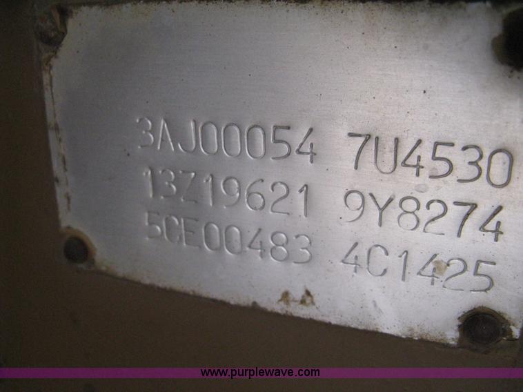 image for item A6043 1989 Caterpillar D30D articulated haul truck