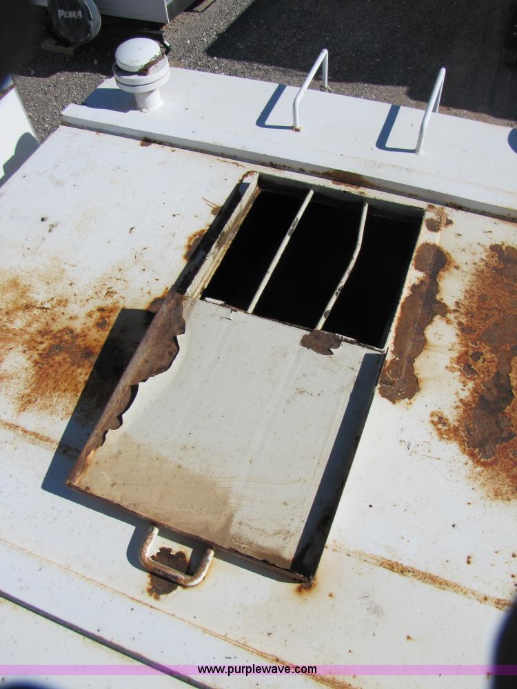 image for item B2196 2005 V.E. Enterprises flat top storage/frac tank