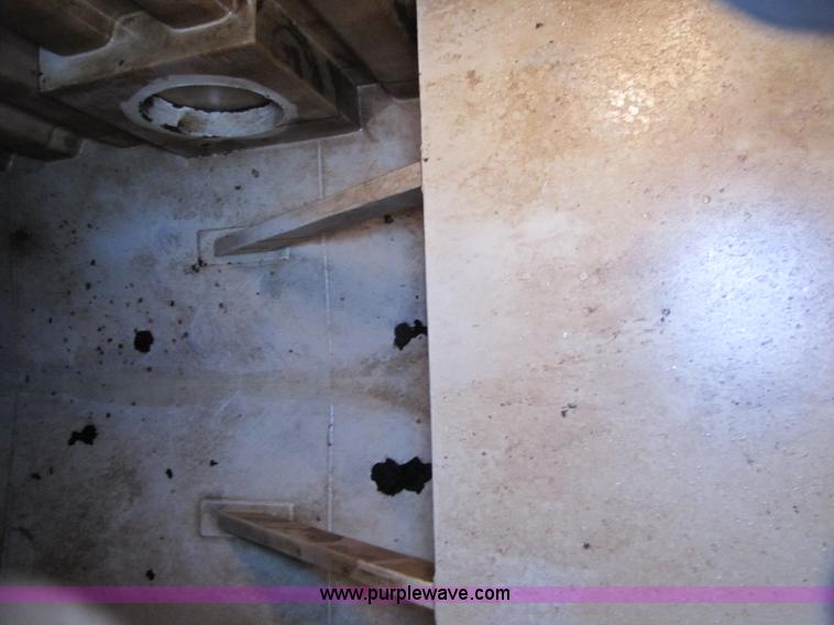 image for item B2196 2005 V.E. Enterprises flat top storage/frac tank