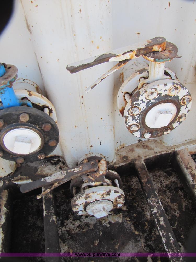 image for item B2198 2005 V.E. Enterprises flat top storage/frac tank