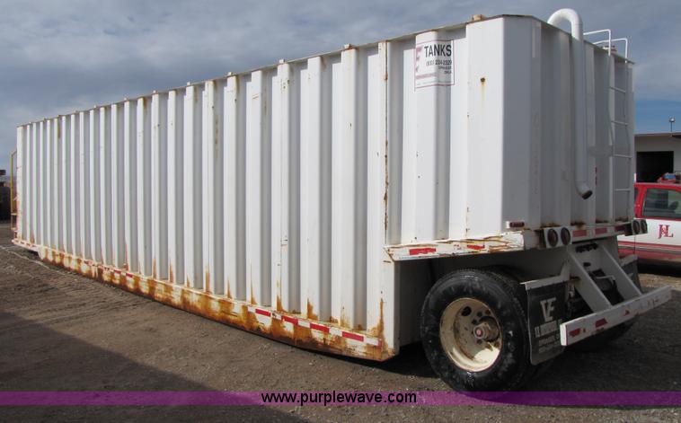 image for item B2198 2005 V.E. Enterprises flat top storage/frac tank