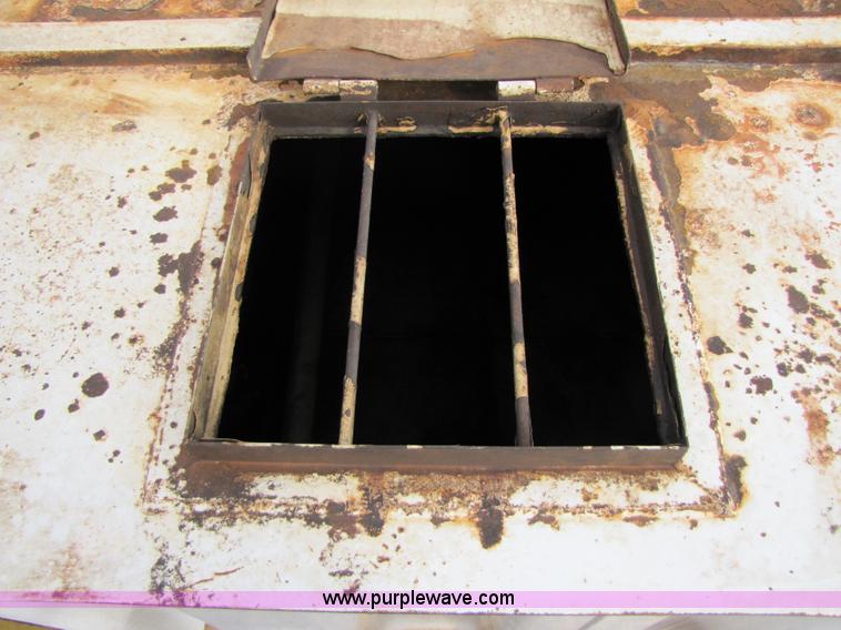 image for item B2215 2005 V.E. Enterprises flat top storage/frac tank