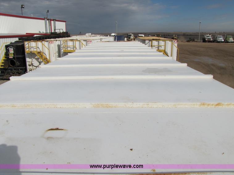 image for item B2216 2005 V.E. Enterprises flat top storage/frac tank