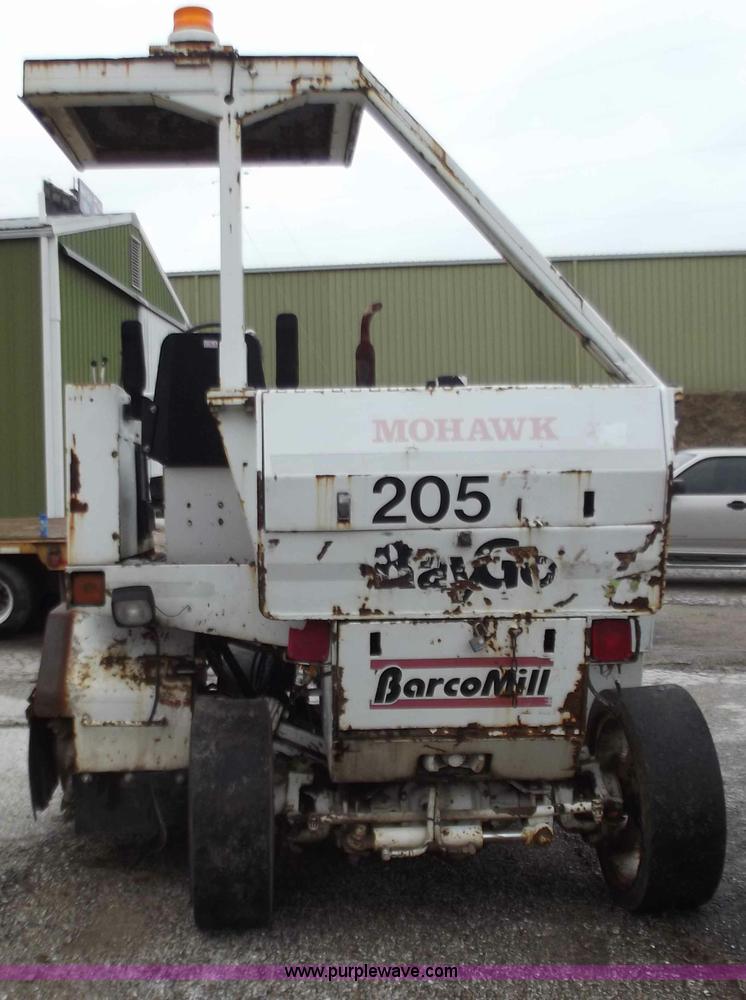 image for item B6228 Raygo 100B ride-on milling machine