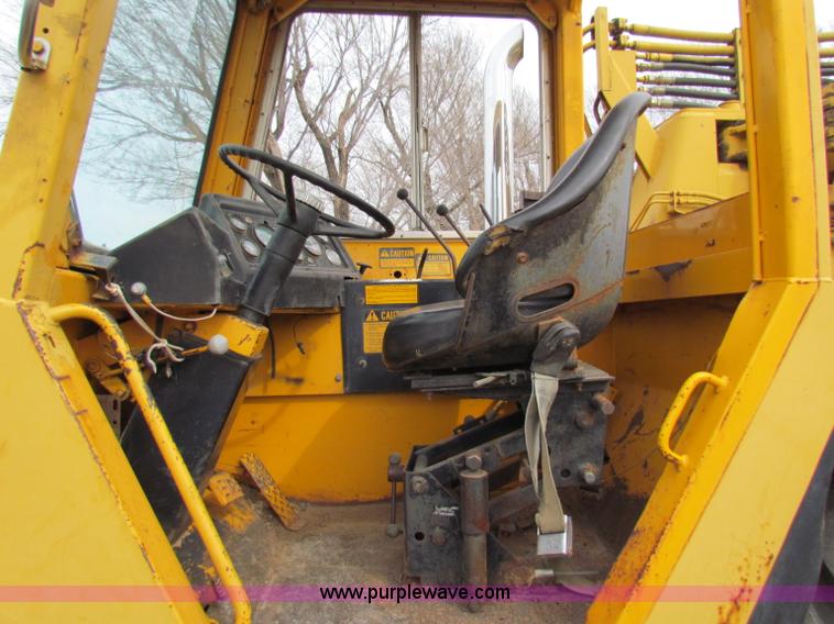 image for item B7064 John Deere 762 scraper