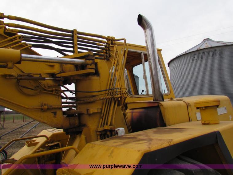 image for item B7064 John Deere 762 scraper