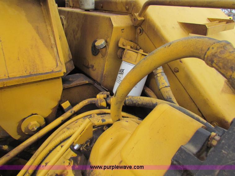 image for item B7064 John Deere 762 scraper