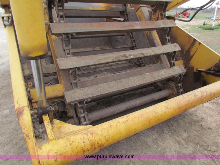 image for item B7064 John Deere 762 scraper