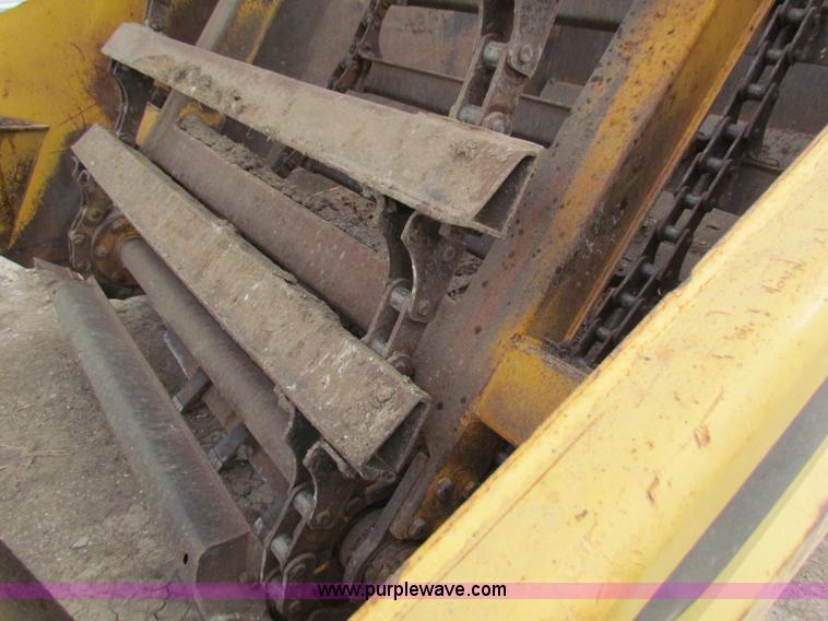 image for item B7064 John Deere 762 scraper