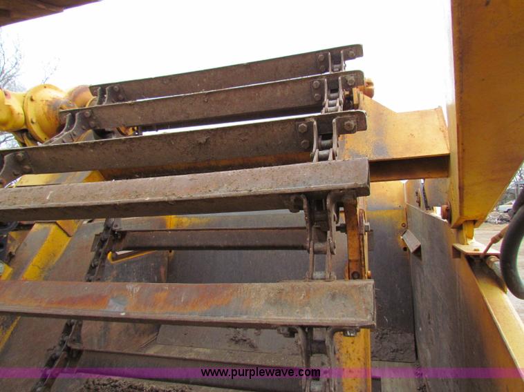 image for item B7064 John Deere 762 scraper